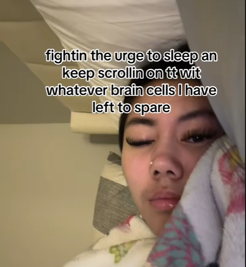 Maya bed rotting and scrolling on phone